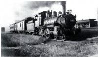 RR train stopping at Aldrich MO in town.JPG