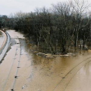 Valley Park JCT view east. The tracks are almost obscured by the floodwaters of the Meramec River here at MP 18.5 in March of 2008.