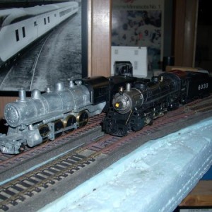 Athearn Genesis 2-8-2 and MRC/Roundhouse 2-8-0
Bought the mikado off ebay, came smashed up.  Have been trying to fix it, but it derails on dirty trac