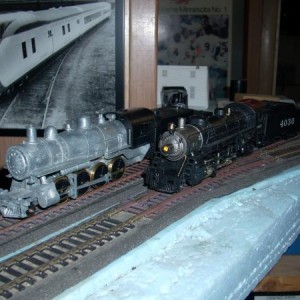 Athearn Genesis 2-8-2 and MRC/Roundhouse 2-8-0
Bought the mikado off ebay, came smashed up.  Have been trying to fix it, but it derails on dirty trac