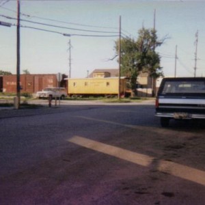 Old Union Pacific wooden caboose on former Leaky Roof line in Belton, MO 1994. This car has been redone.