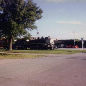 Okmulgee and Northern consolidateion steamer on former Leaky Roof line in Belton, MO 1992