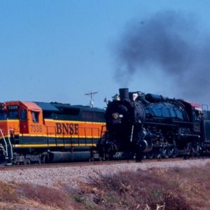 Frisco 1522 passes a freight