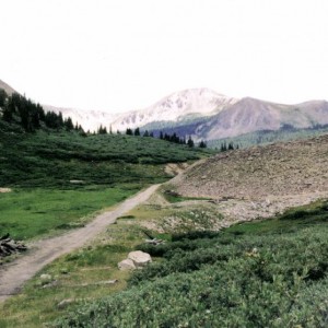 This shot was taken from near the portal looking westward.  The turntable pit is to the right of the ROW, and it lies just before the promontory.