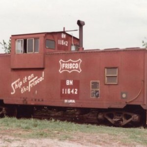 Good details of a former 1400 series caboose that has been stenciled OC Local which is indeed the train it just derailed with.