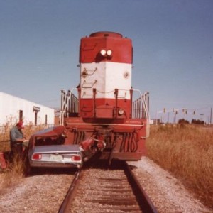 You can see the crossing a ways in the background. Notice anything unusual on the long hood of the GP38? My vote is either 686 or 413 but I've seen pi