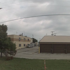 Martha Truman Rd crossing looking north toward Red Bridge Rd. A storage shed is now in the middle of the ROW.