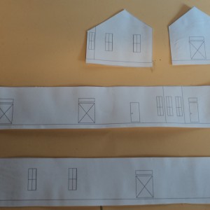 Paper ctuouts for exterior of Scammon KS Depot for fitting of windows and doors.