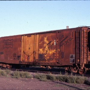 50 foot plugdoor boxcar 8574 with 12 foot door - August 1983 West of Shelby, Montana