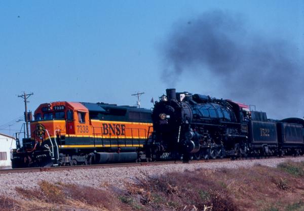 Frisco 1522 passes a freight