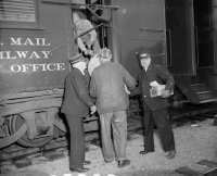 Flemington, Mo ,mail unloading 2-1-1953.jpg