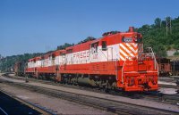 SLSF #600, 519, 523, 542 EMD GP7 at 19th St Yard with caboose.jpg