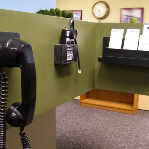 This photo shows the communication system (phones), a Digitrax throttle pocket and a car card box. My phone system is a very elementary party line sys