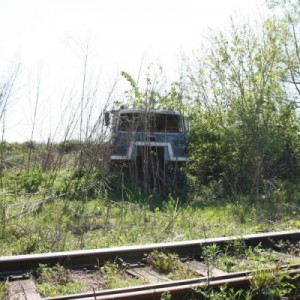 I'm willing to bet this truck saw the last Frisco train to travel these tracks. It's sitting just north of the diamond