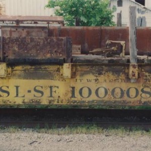 SLSF 100008 
Middle of car close-up view. Note how number has been masked and repainted.