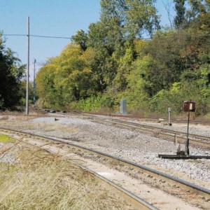 Frisco/MoP interlock/diamonds. Frisco tracks run east to west (right to left).  West end to Arkansas River Bridge.