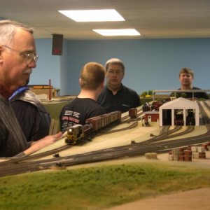Dec 19 2009 Action at Rosedale.  H10-44 281 is under the steady hand of John McBee of Bella Vista, Ark.  Ethan and Mark are discussing the caboose hop