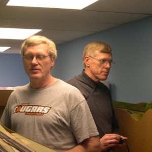 Dec 19 2009 Paul and Karl Brand. Operating the Northern Division is so easy a caveman could do it, but Paul said it could be done with his eyes closed
