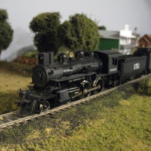 Two car passenger train northbound crossing Crooked Creek.