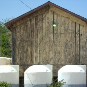 Main Street freight depot east side. The shorter white tanks are 5 and a half feet tall.