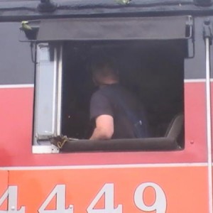 Fireman on Southern Pacific GS-4 4449 during a layover in Alma Michigan during a all day excursion.
