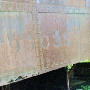 Ex-Rock Island Baggage/Passenger Coach. Faded number, #95035. This Coach is on display at The ES&NA RR Yard.