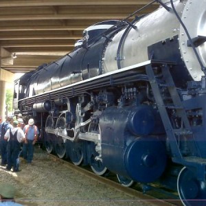 Moving backwards through a 24 degree curve under HWY 75 just North of 17th St on the main line pulled by Santa Fe 2790. She was only built for a 20 de