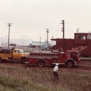That old firetruck fits right in with those early 70s Frisco section gang trucks. Those 1400 series cabooses did not have radios by the way. I doubt t