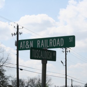 Street sign that marks the crossing in Carrollton, AL