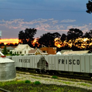 Blairstown, MO. Photoshopped in a sunrise backdrop, everything else is N scale. What a difference a good backdrop makes!