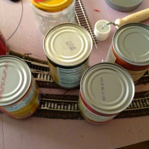 third section 2 : Canned goods are excellent weights to hold the flex-track into the Dap 320 adhesive until it dries.