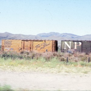 40 foot plugdoor boxcar  6607 - August 1983 - Shelby, Montana
