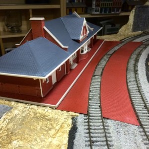 depot bricks 4 - The center platform is in. Some additional paint touchup, weathering, and landscaping around it will improve the look. The parking lo